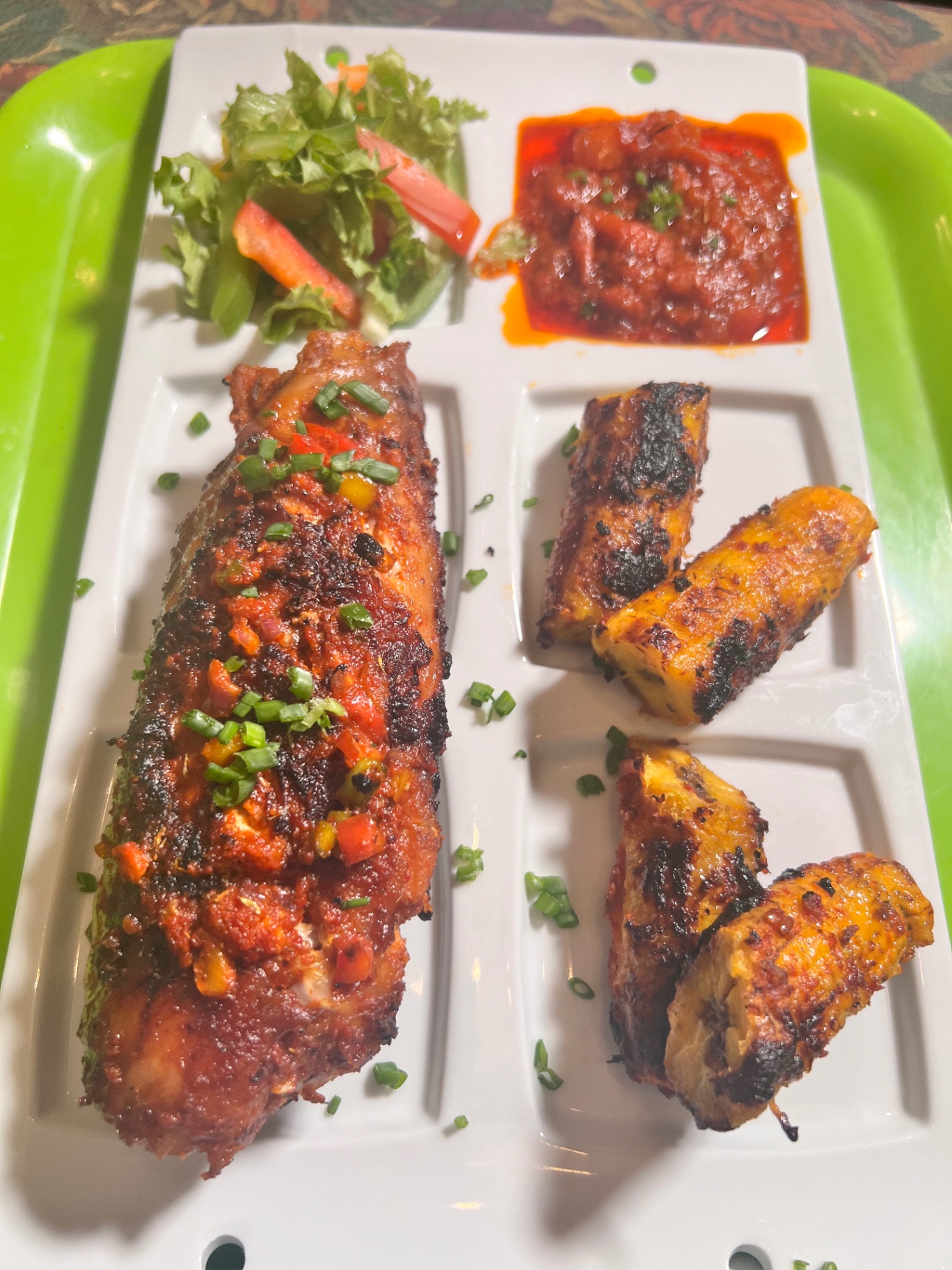 Grilled fish with roasted plantain, salad and pepper sauce